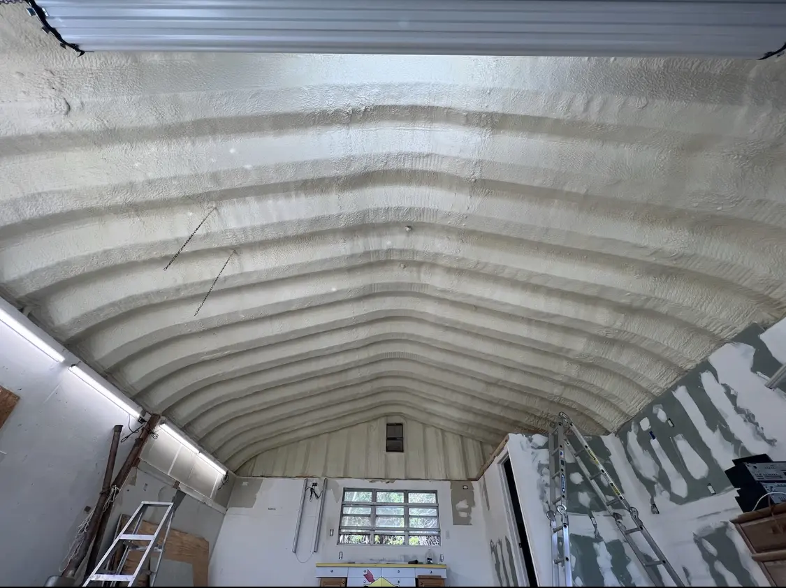 Spray polyurethane foam applied to the underside of a metal roof deck in Old Saybrook